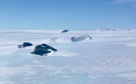 Antarctic hills and plateau as we near Wolf Fang Airport