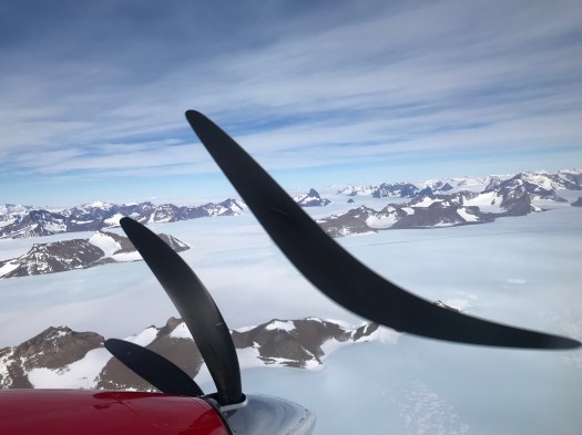 Mountains seen shortly after take off from the Basler. Prop is too slow for the camera to miss.