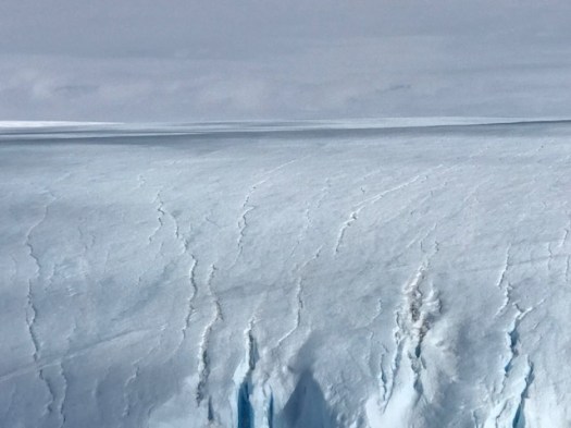 The glacier hill opposite our camp. It cracks and breaks away during our warm week in camp.