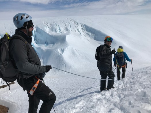 Scott, mark and Manu head out to climb the glacier.
