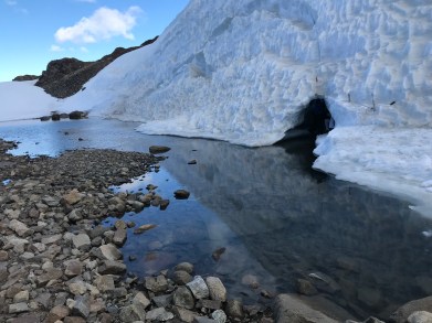Entrance to ice cave. Not easy to straddle the opening and stay dry.