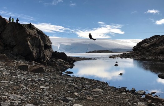 Mark zip lining across the river. Nice and benign. I did it too.