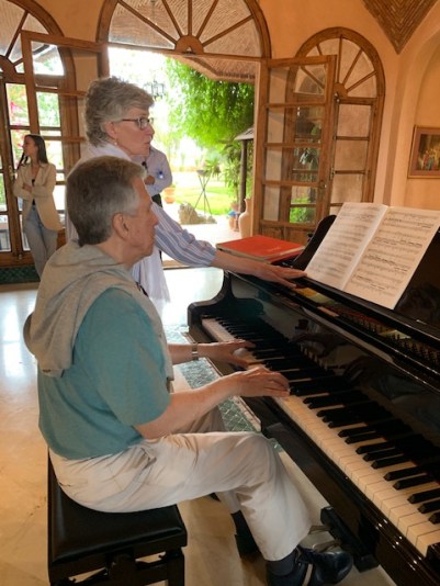 Joel rehearsing for his performance on Saturday evening. His wife Cindy is turning the pages for him.