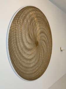 A rose made from thousands of yards of stretched brass wire. Again I did not get the name, but the description is very philosophical and worth reading.