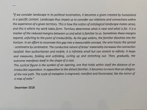 The description accompanying the brass rose.