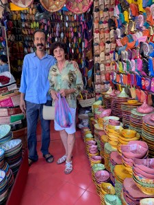 This friendly vender sold me some scarves. He has been working in this shop for 34 years and says it is not very profitable.