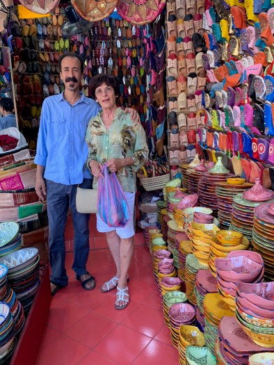 This friendly vender sold me some scarves. He has been working in this shop for 34 years and says it is not very profitable.