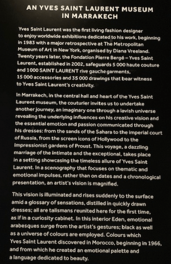 Story of Yves Saint Laurent on museum wall