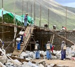 They carried the stones up a ladder where men unloaded them to build a&nbsp;wall.
