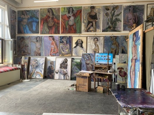 Najmidin's wall of work.