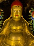 Brass sculpture of a Red Hat&nbsp;Buddha