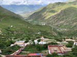 View of lower monastery and three stupas as we begin our way down the&nbsp;hill