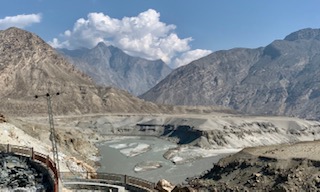 Confluence of two river and three mountain ranges.